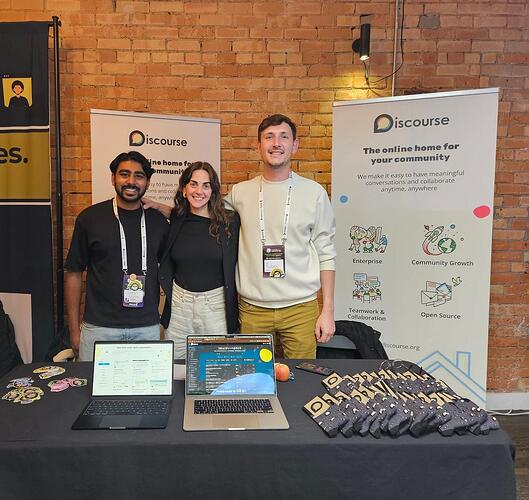 photo of Discourse team. Saif, Jenny and Ruben at the Discourse booth of Toronto Community Week.